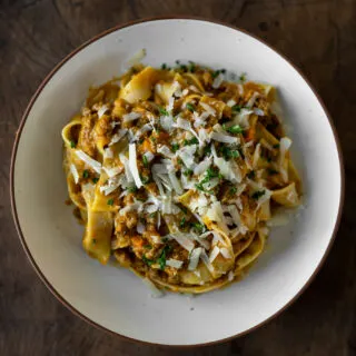 bowl of pumpkin bolognese with pappardelle