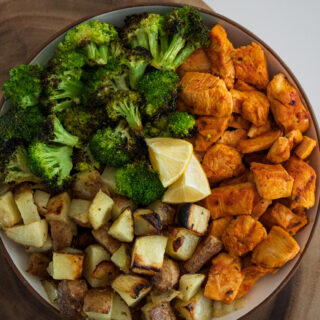 buffalo ranch chicken bites with roasted potatoes and broccoli